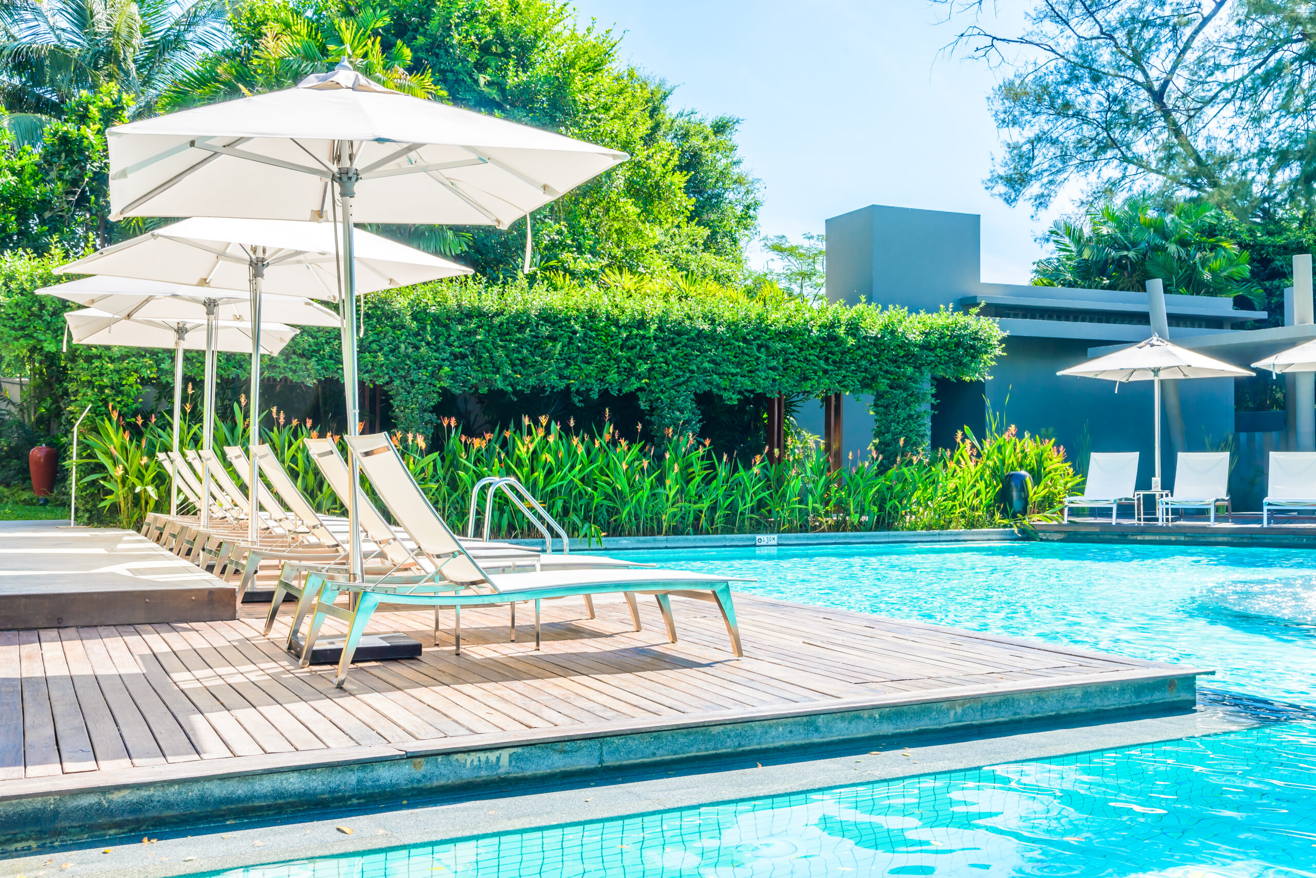 Umbrella with chair in hotel  swimming pool resort